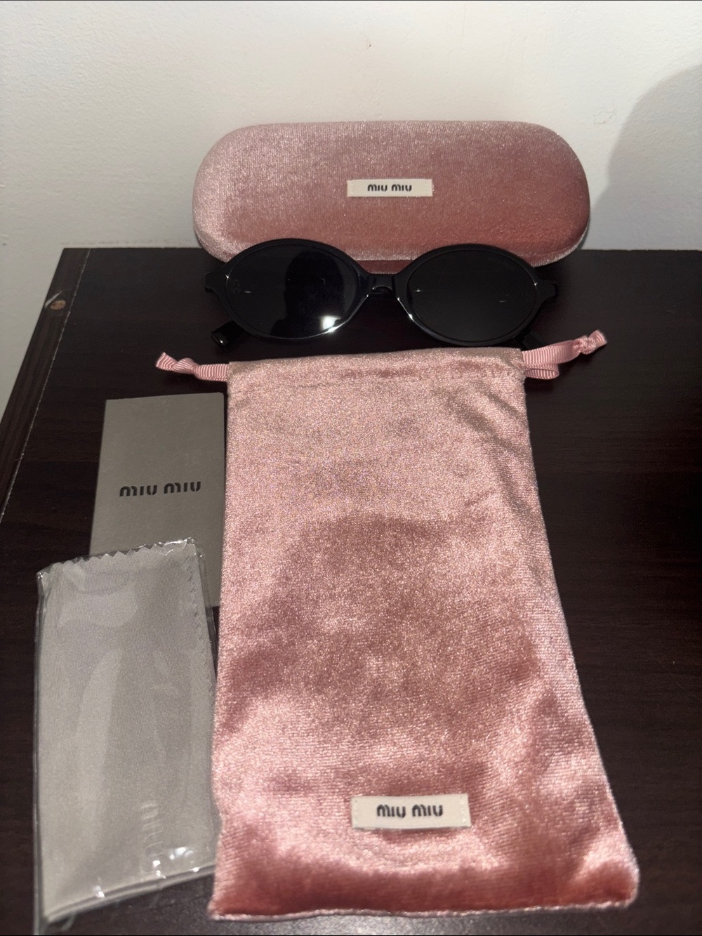 Miu Miu Black Round Sunglasses with Pink Velvet Case and Pouch